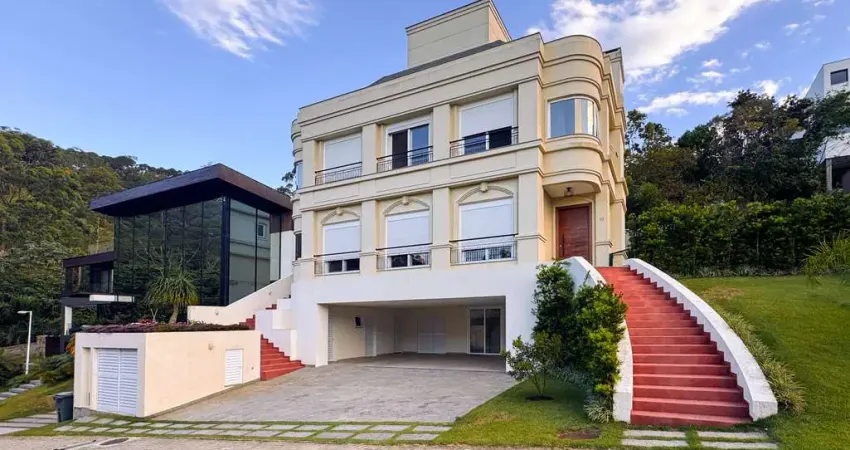 Casa à venda em condomínio em Cacupé, 319m² de privativa, 4 suítes e 3 vagas, R$ 4.950.000,00