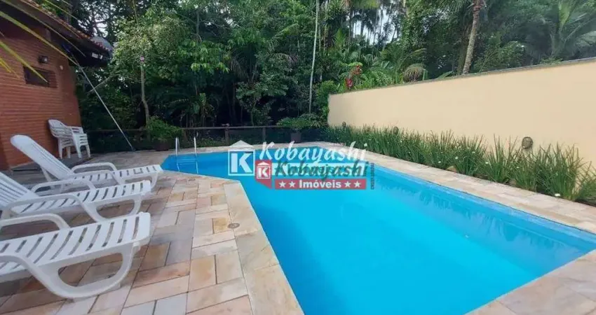 Casa com 4 dormitórios, 300 m² - venda por R$ 3.400.000,00 ou aluguel por R$ 12.000,00/mês - Riviera Módulo 26 - Bertioga/SP