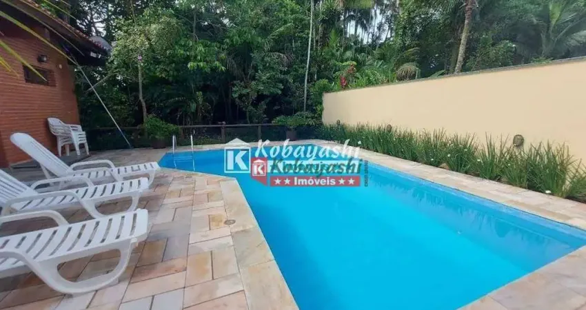 Casa com 4 dormitórios, 300 m² - venda por R$ 3.400.000,00 ou aluguel por R$ 12.000,00/mês - Riviera Módulo 26 - Bertioga/SP