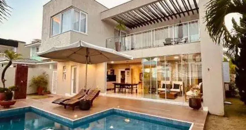Excelente casa com arquitetura moderna com 306 m2 com 4/4 em Alphaville L. Norte - Camaçari