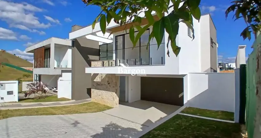Sua Próxima Residência em Alphaville, Juiz de Fora. Casa de 4 quartos sendo 3 suítes mais 1 reversível , piscina, área gourmet, 2 vagas de garagem à venda no Condomínio Alphaville em Juiz de Fora