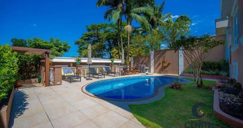 Incrível casa com 4 suítes, 385 m² no coração da granja viana!