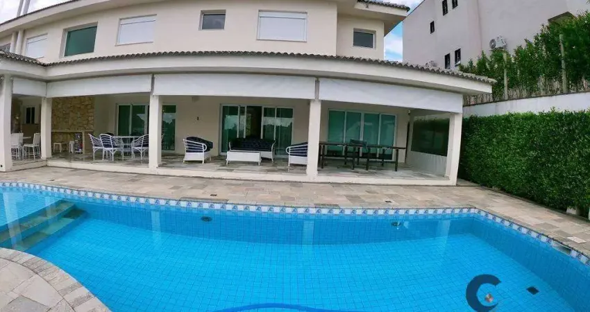 Casa de alto padrão com 5 suítes, área gourmet completa e quadra de tênis!