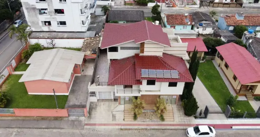 Casa para Venda em Içara, Primeiro de Maio, 4 dormitórios, 1 suíte, 5 banheiros, 6 vagas