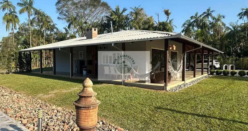 Sítio com 20.000 m², com uma linda residencia, frente para o asfalto, escriturada, em pirabeiraba