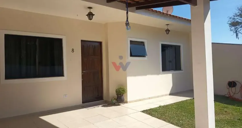 Casa aconchegante em condomínio fechado com 3 quartos, churrasqueira e garagem