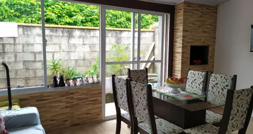 Casa a venda em condomínio fechado de 02 dormitórios com vaga de garagem coberta no bairro bela vista em palhoça-sc