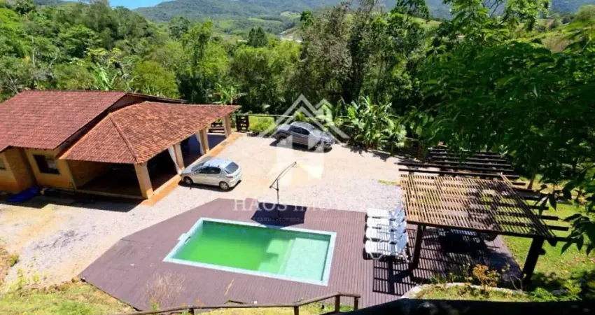 Refúgio natural e oportunidade de negócio: chácara espetacular de 2 hectares em palhoça