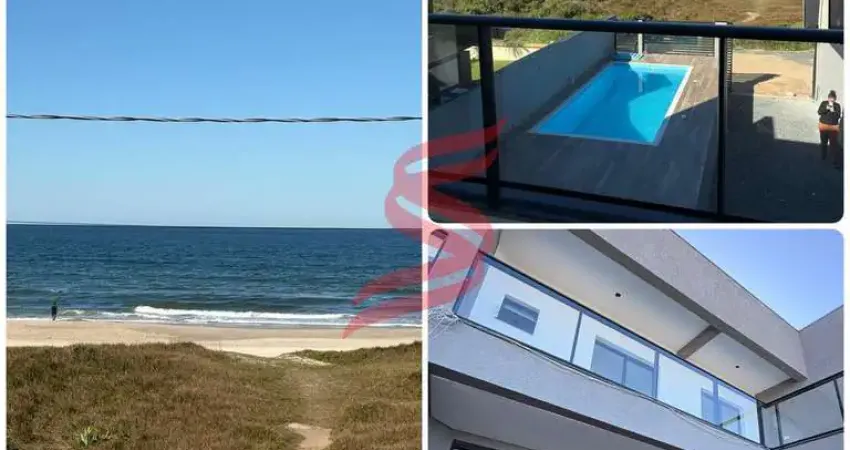 Sobrado de Alto Padrão em Frente ao Mar – Viva com Elegância e Vista Privilegiada!