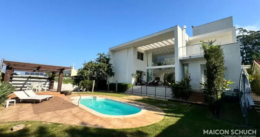 Casa 6 dormitórios sendo 5 suítes em condomínio fechado, cacupé - florianópolis/sc.