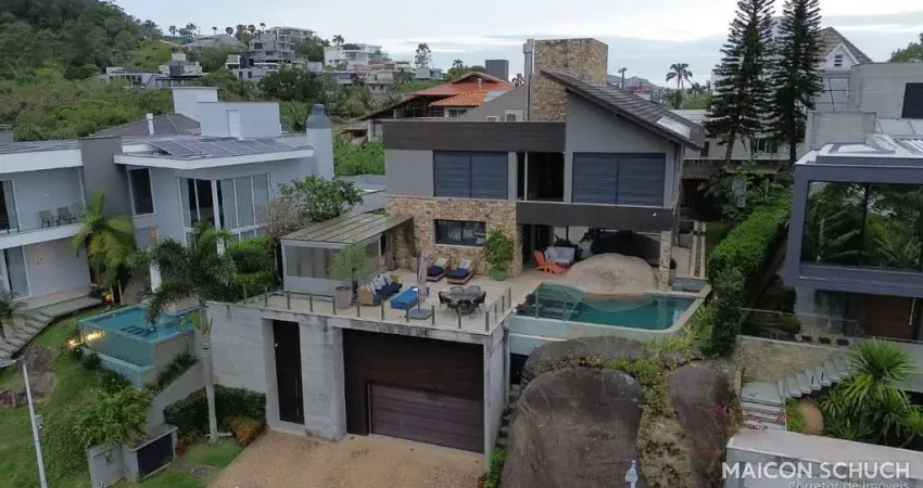 Casa vista mar com 4 suítes (máster com banheira de imersão), elevador, sauna, piscina com spa, studio, sala de cinema, cacupé – florianópolis/sc.
