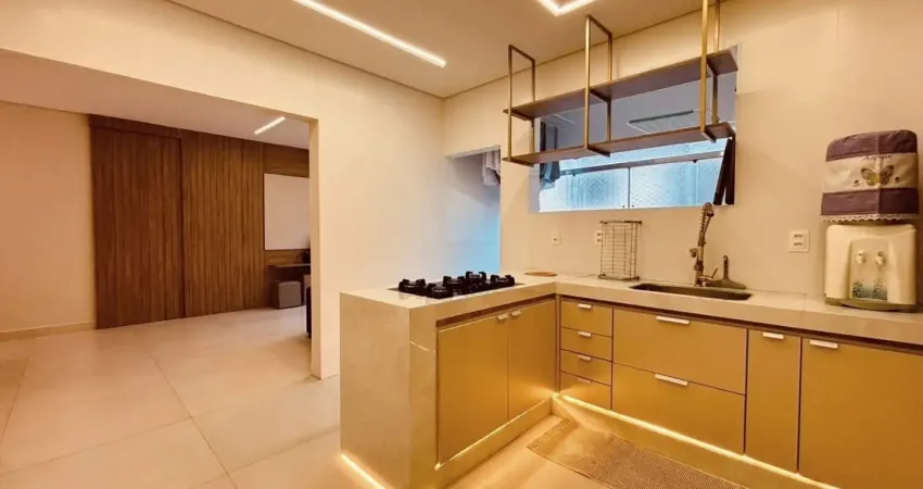 2 quartos sendo 1 suíte ,3 wcs, garagem box fechada,1 pavimento