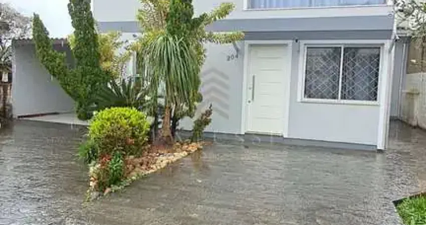 Casa 03 dormitórios, sendo uma suíte com banheira hidromassagem