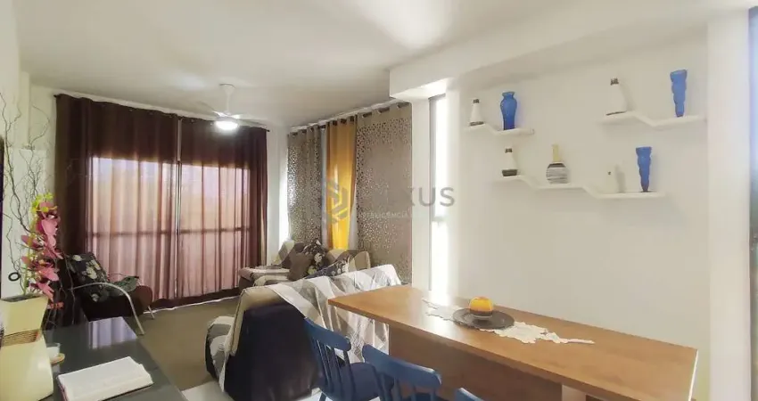 Apartamento com varanda a duas quadras da praia do tombo, guaruja