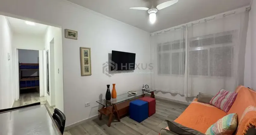Apartamento com varanda reformado e mobiliado a duas quadras da praia das asturias, guaruja