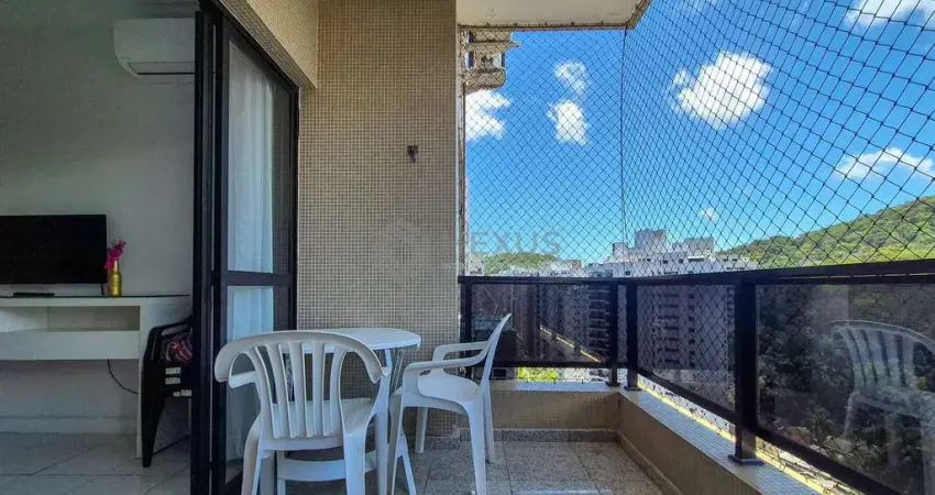 Apartamento com varanda e lazer na praia das pitangueiras, guaruja.