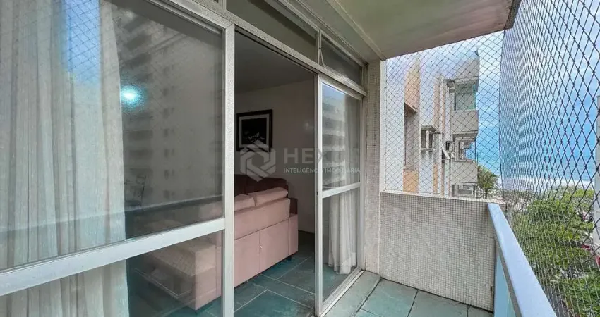 Apartamento com varanda e vista mar na quadra mar da praia das pitangueiras, guaruja