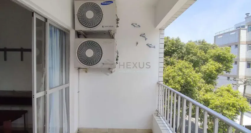 Apartamento com varanda e despesa baixa na praia das asturias, guaruja