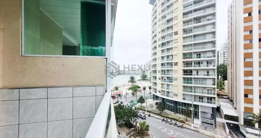 Apartamento com varanda e vista mar na quadra mar da praia das pitangueiras, guaruja
