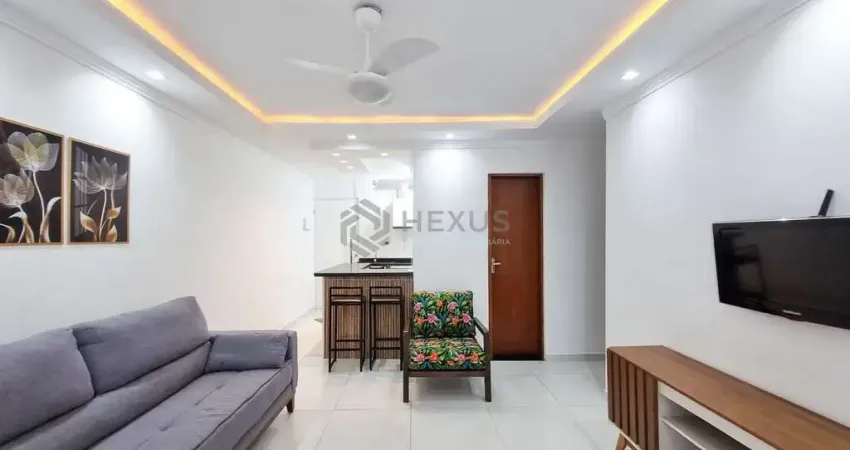 Apartamento com varanda e vista mar na quadra mar da praia das pitangueiras, guaruja