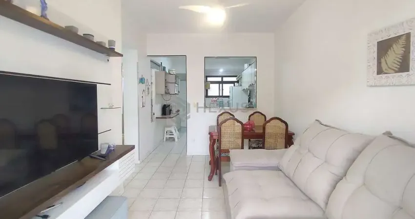 Apartamento reformado com varanda a venda na praia das asturias, guaruja