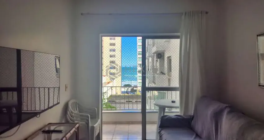 Apartamento com varanda e vista mar na beira mar da praia das pitangueiras, guaruja
