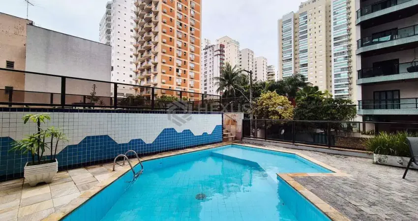 Apartamento com varanda e lazer na praia das pitangueiras, guaruja
