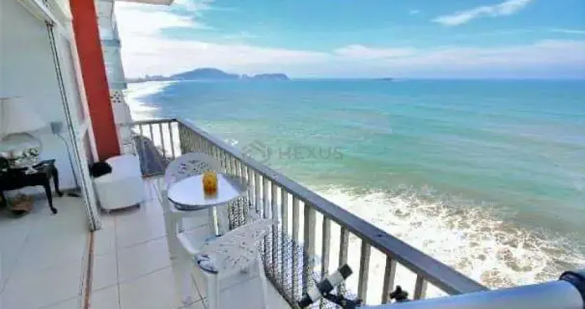Apartamento frente mar reformado com varanda na praia das pitangueiras, guaruja