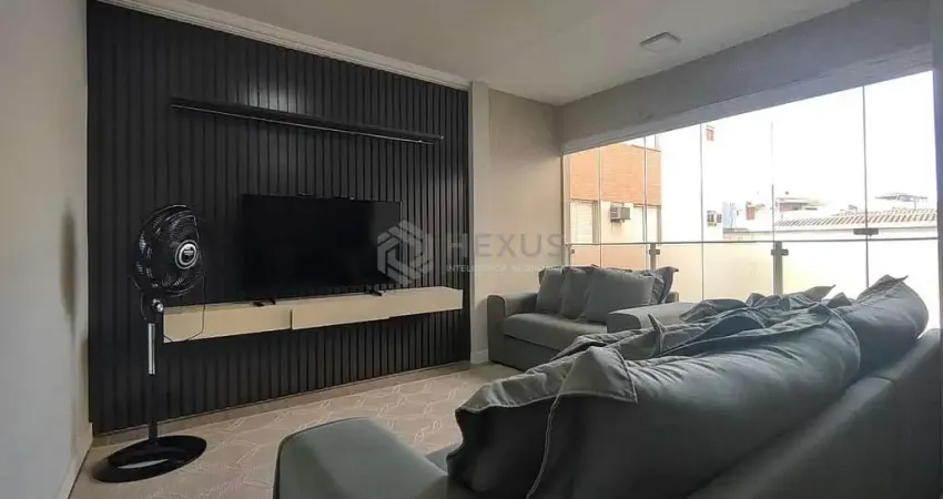 Apartamento com varanda e lazer na praia da enseada, guaruja