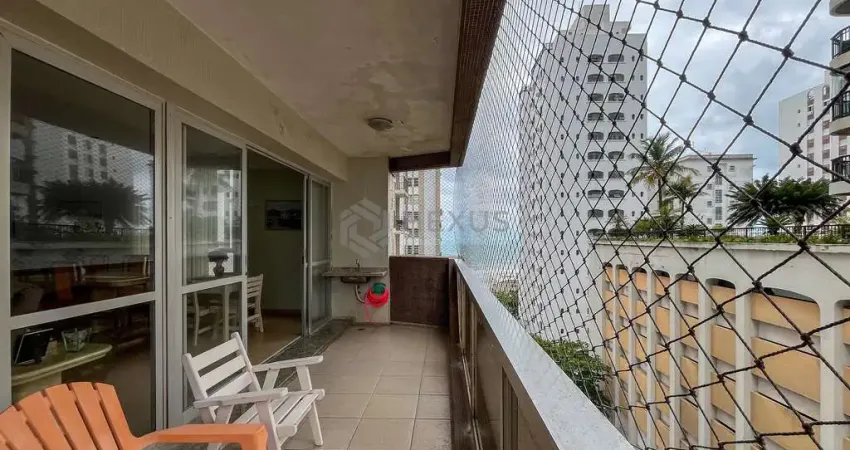 Apartamento com varanda e vista mar na quadra mar da praia das pitangueiras, guaruja