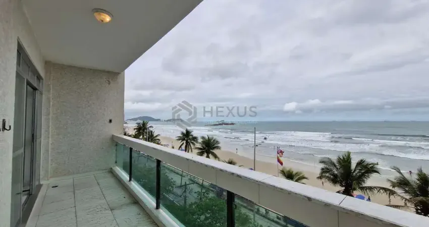Apartamento reformado frente mar com varanda na praia das pitangueiras, guaruja