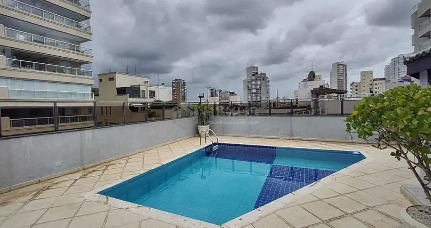Apartamento com varanda e lazer na Praia da Enseada, Guaruja