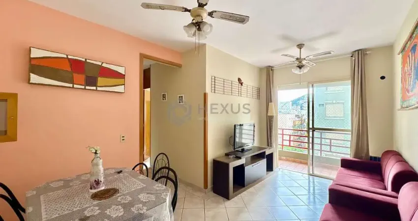 Apartamento com varanda e lazer na Praia da Enseada, Guaruja