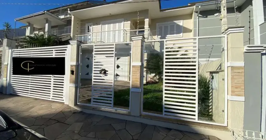 Excelente sobrado com 04 dormitórios, sendo 01 suíte, no moinhos de vento em canoas