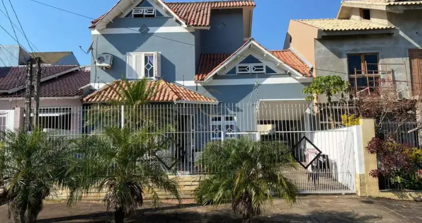 Casa com 3 quartos à venda na Rua Andrômeda, 359, Moinhos De Vento, Canoas
