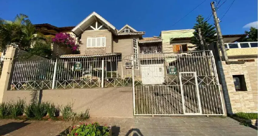 Casa com 4 quartos à venda na Avenida Doutor Severo da Silva, 1233, Moinhos De Vento, Canoas