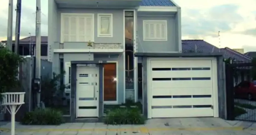 Casa com 4 quartos à venda na Rua Mauricio de Souza, 60, Harmonia, Canoas