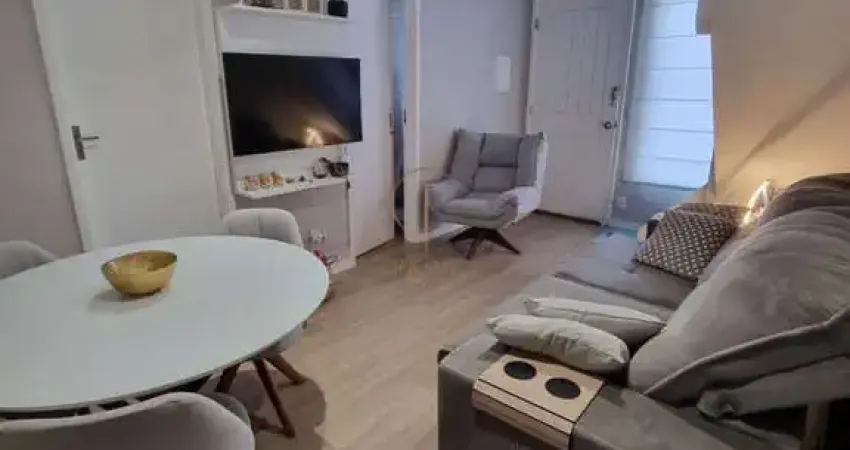 Casa térrea em condomínio, 02 dormitórios e 02 vagas para veículos no bairro rio branco