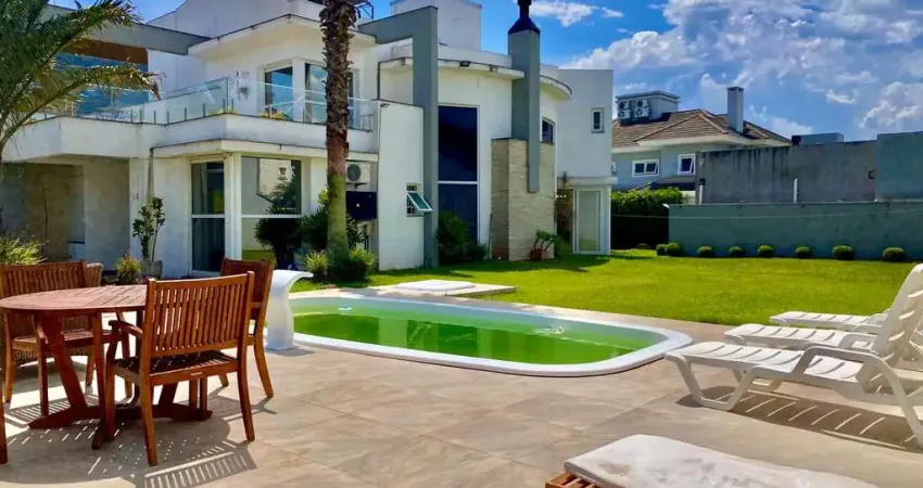 Sobrado com 04 suítes - piscina - área gourmet - no moinhos de vento - canoas