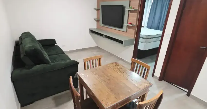 Apartamento impecável em prédio com elevador e garagem excelente localização