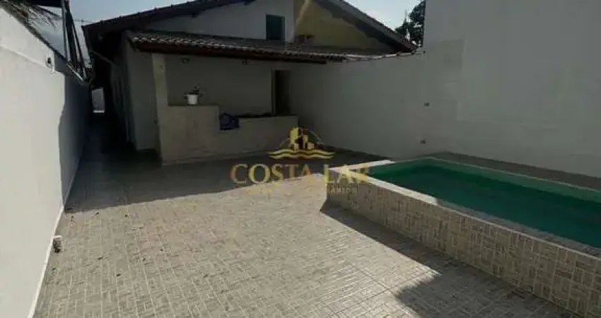 Casa térrea com piscina e área gourmet à venda no bairro maracanã, praia grande