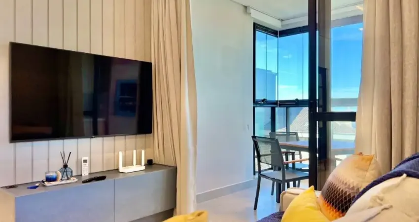 Vista para o mar e mobiliado! Apartamento na Praia de Palmas, com 3 quartos e 2 vagas de garagem!