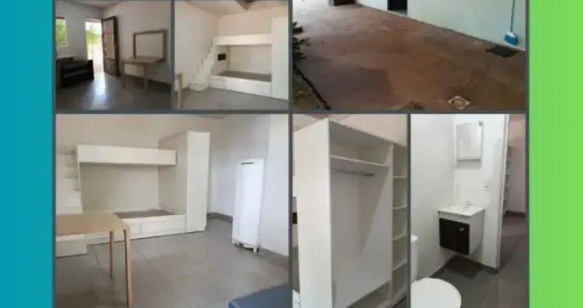 Kitinet tipo estudio, com cama de casal, cama de solteiro e guarda roupa (peça unica), mesa de cozinha, balcão banheiro, vaga para estacionamento, etc