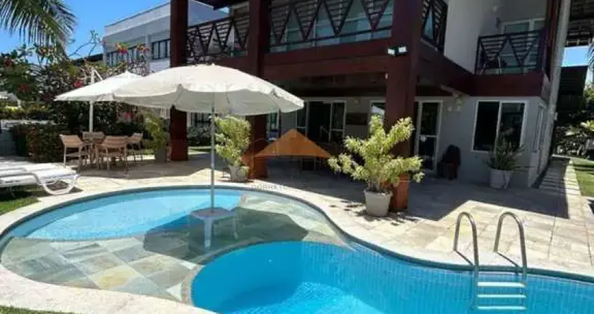 Casa com 4 quartos, 485m², varanda, piscina e 4 vagas de garagem em condomínio fechado em muro alto