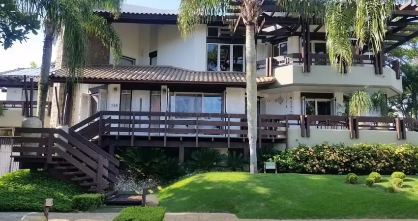Casa em condomínio fechado com 5 quartos à venda na Rua dos Tambaquis, Jurerê Internacional, Florianópolis