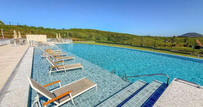 Reserva amary - terreno à venda no condomínio fechado com beach clube exclusivo de frente para a praia de peracanga em nova guarapari/es.