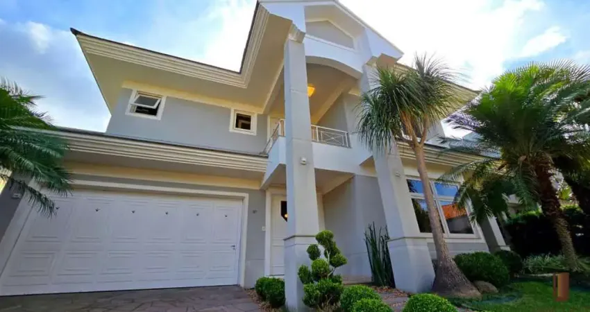 Casa no condomínio vivendas do parque iv a venda no bairro nossa senhora das graças em canoas - três suítes, piscina.