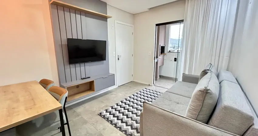 Lindo apartamento totalmente mobiliado no iririú, com 2 dormitórios e sacada com churrasqueira!