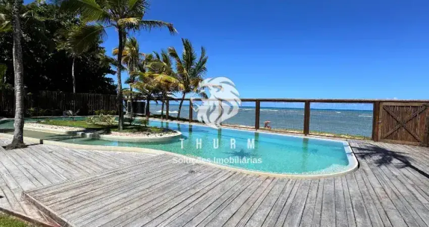 Casas pé na areia a venda em arraial ' d ajuda em condominio fechado