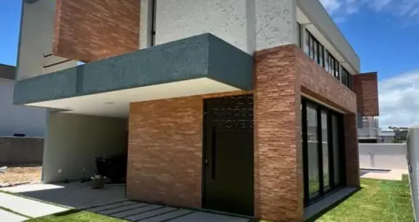 Casa com 4 suítes e área de lazer completa à venda no condomínio vista lagoa